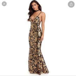 Black and gold sequin dress